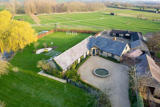 This barn conversion with traditional features and a lot of land could be yours for £1.75 million.