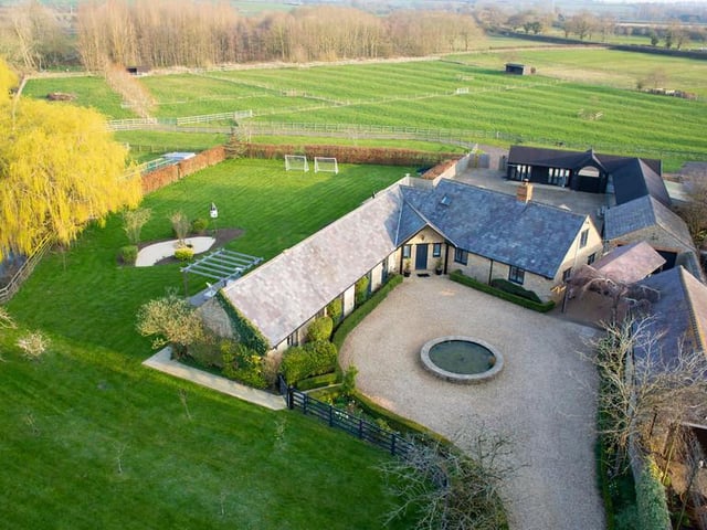 This barn conversion with traditional features and a lot of land could be yours for £1.75 million.