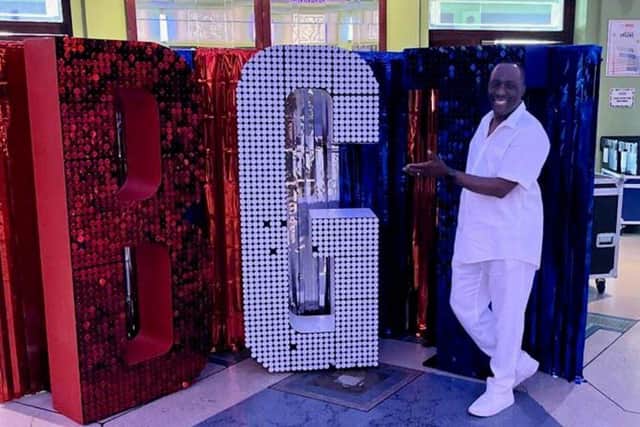 Ernie pictured next to behind-the-scenes 'BGT sign
