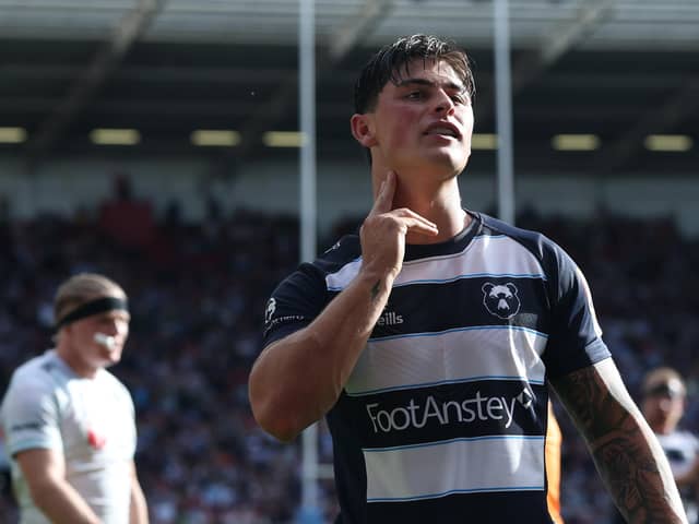 Louis Rees-Zammit mimicked Henry Pollock's pulse check celebration (photo by David Rogers/Getty Images)