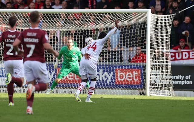 Devante Cole scores Barnsley's second goal to effectively wrap up victory at Sixfields on Saturday. (Photo by Pete Norton/Getty Images)