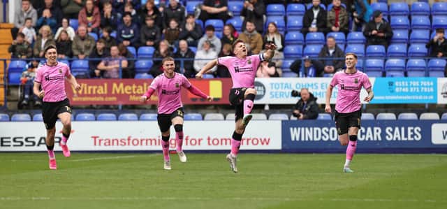 It was fitting that Sam Hoskins scored the promotion-winning goal - and what a strike it was.