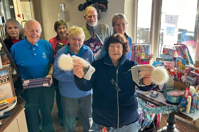 Mother Christmas Jeanette Walsh collecting gifts from Brampton Heath Golf Club/Mother Christmas