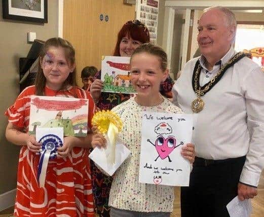 Cllr Bernie Tiller, Mayor of Brackley with the winners. L-R front Amelia (2nd) and Ffion (3rd). Back - Monty's mum who accepted the award on his behalf
