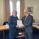 SSAFA’s Sue Walters receiving her award from HM Lord Lieutenant James Saunders-Watson