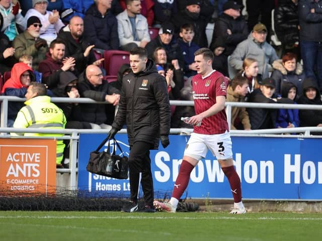 Aaron McGowan walks around the pitch after coming off injured against Derby. Picture: Pete Norton