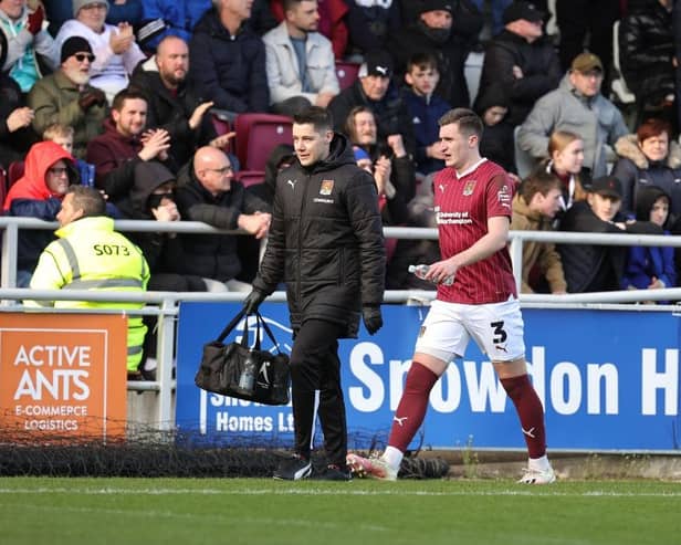 Aaron McGowan walks around the pitch after coming off injured against Derby. Picture: Pete Norton