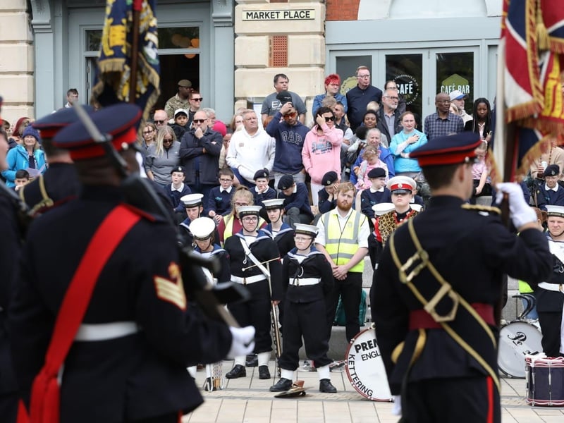 Kettering town centre: crowds line town centre to welcome The Royal Anglian Regiment for Armed Forces Day parade /National World