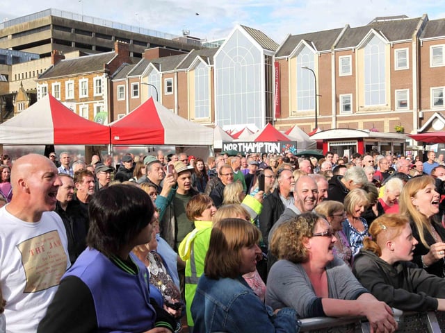 Crowds watching Dr. Feelgood at Northampton Music Festival in Market Square.