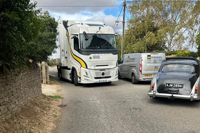 An HGV attempts to get around the A422 closure by driving along the narrow Queen's Street