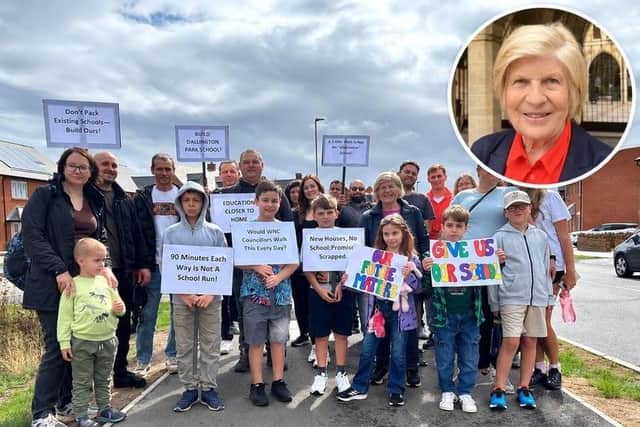 Families from the new Dallington Grange housing estate protest for a new school to be built
