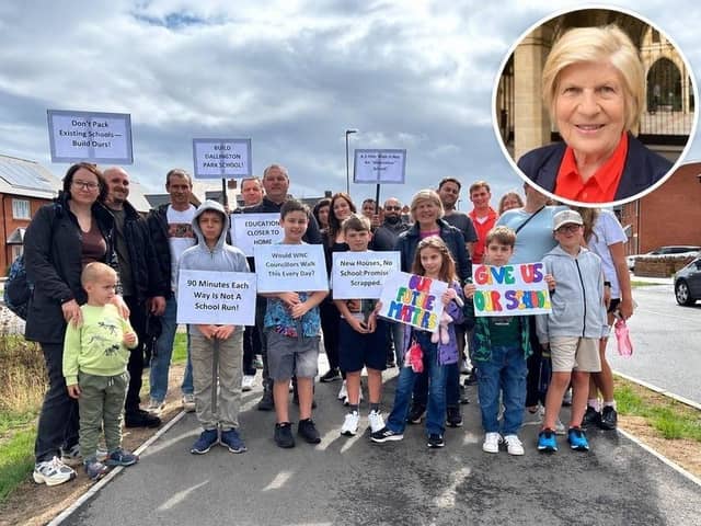 Families from the new Dallington Grange housing estate protest for a new school to be built