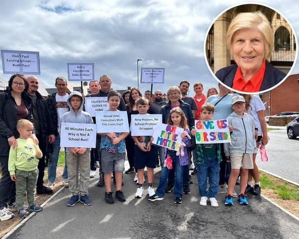 Families from the new Dallington Grange housing estate protest for a new school to be built