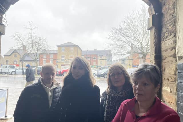 Several Brackley traders gathered in the town centre on Friday (January 16) to bring attention to MP Sarah Bool's petition and the campaign to save free parking in Brackley.  (Left to Right) Danny Webster, owner of The Old Bakery; Sarah Bool MP, resident Victoria Embley and Sarah Eastman the owner of Brackley Kitchen Deli.