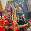 Bespoke Ballroom's young stars at the NATD Medalist of the Year National Finals in Blackpool along with academy founder and Strictly star, Kristina Rihanoff.