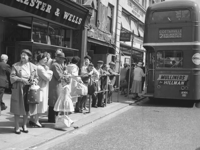 Looking back
old glass negs
bus queue Mercers Row Northampton town centre
