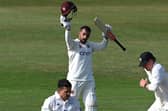 Saif Zaib celebrates reaching his century (Photo by Shaun Botterill/Getty Images)