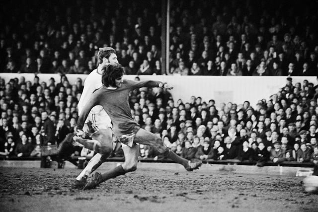 Manchester United player George Best scores against Northampton Town on 7th February 1970.