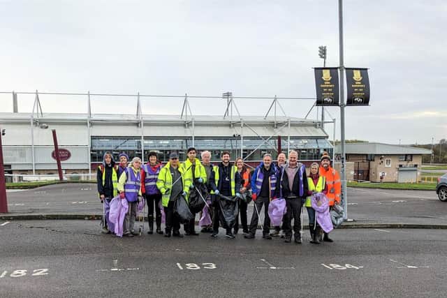 West Northamptonshire Council partners with Northampton Town Football Club Community Trust and Northants Litter Wombles to tackle litter.