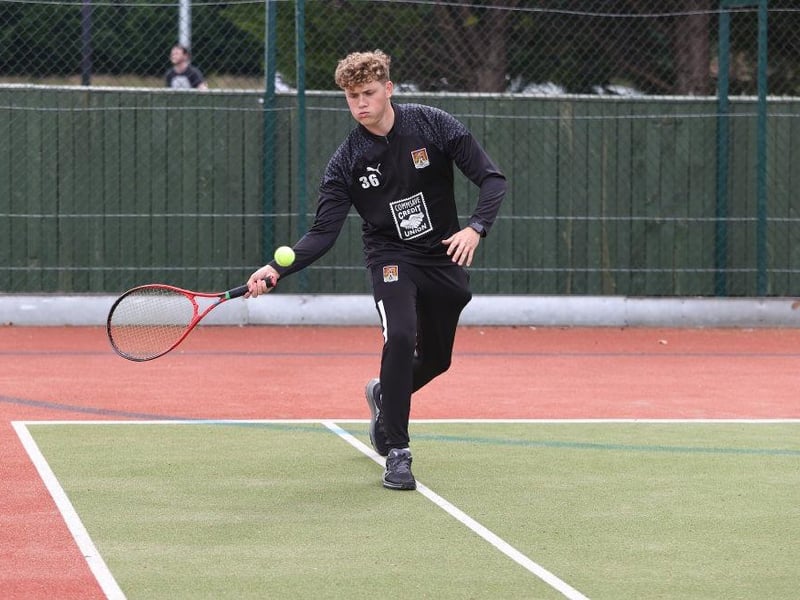 Young goalkeeper James Dadge plays a bit of tennis