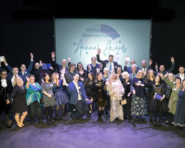Annual Awards winners &amp; judges celebrating on stage 