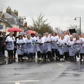 And they're off... Olney's famous pancake race begins