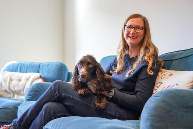 Michelle Hardwick with her hearing dog George.