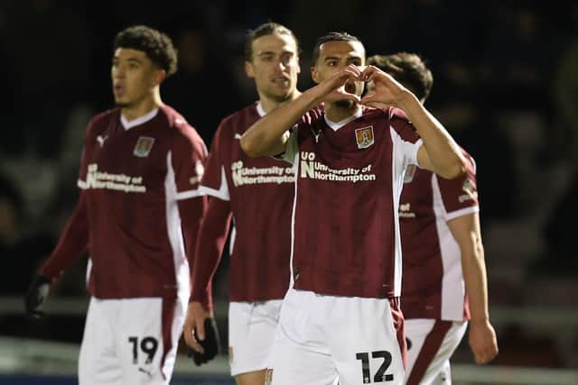 Nesta Guinness-Walker celebrates after scoring to put the Cobblers 1-0 up against Huddersfield Town at Sixfields on Tuesday night (Picture: Pete Norton)