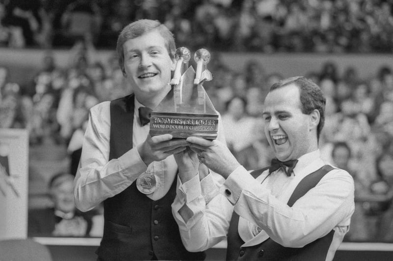 Steve Davis (left) and Tony Meo with the trophy after winning the snooker World Doubles Championship at the Derngate Centre, Northampton on 14th December 1987.
