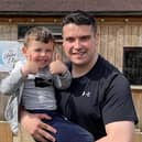 Shadow cabinet member for education at West Northamptonshire Council (WNC), councillor Harry Barrett, with one of his sons.