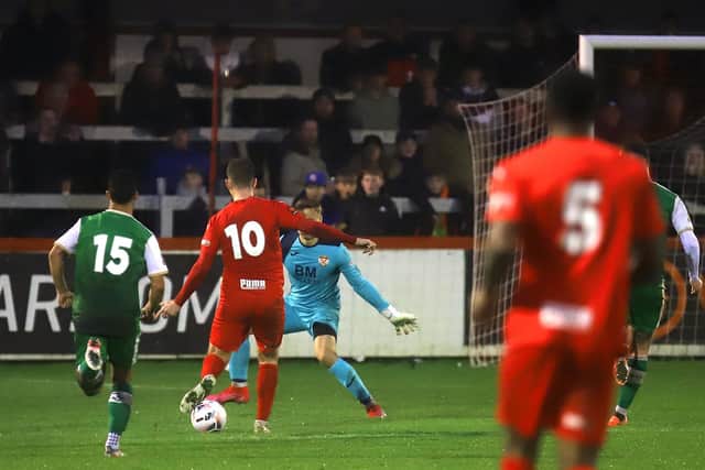 James Armson wrapped up the points with this cool finish for his second goal in Brackley Town's 3-0 success over Kettering Town. Pictures by Peter Short