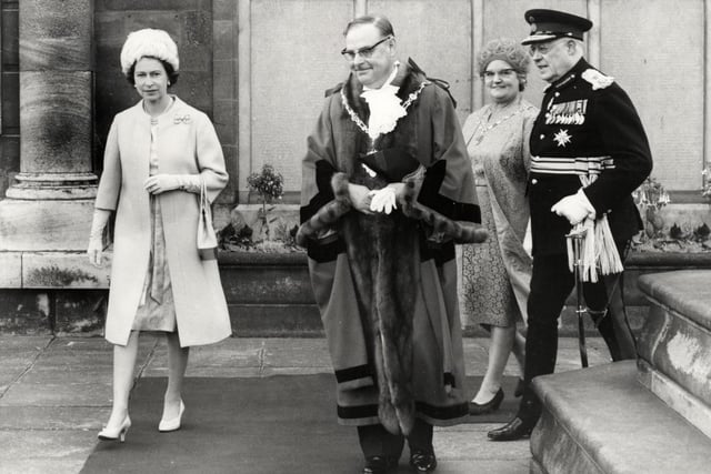 The Queen passes Kettering cenotaph during royal visit on July 9, 1965