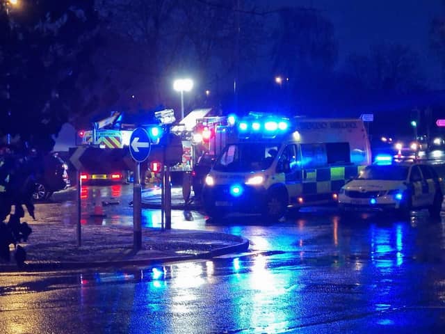 Emergency services deal with the crash on Kettering Road North, Northampton, on Tuesday. Photo: RICHARD DURHAM