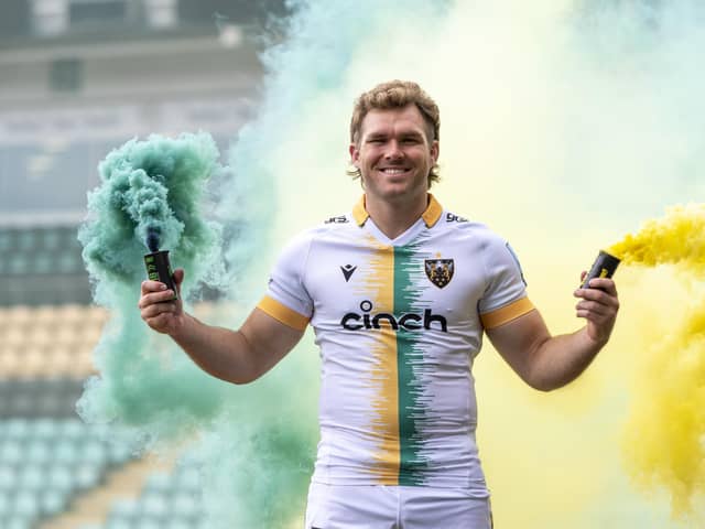 Angus Scott-Young showing off Saints' new away kit (pictures: James Fitchew)