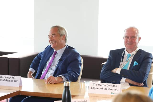 Reform UK leader Nigel Farage with leader of North Northants Council Cllr Martin Griffiths at the Corby Cube/National World
