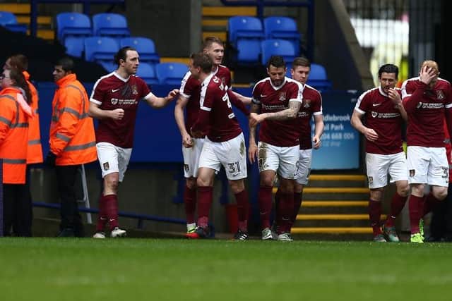 Michael Smith celebrates with his team-mates after scoring for Northampton against Bolton Wanderers in 2017.  (Photo by Pete Norton/Getty Images)