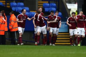 Michael Smith celebrates with his team-mates after scoring for Northampton against Bolton Wanderers in 2017.  (Photo by Pete Norton/Getty Images)