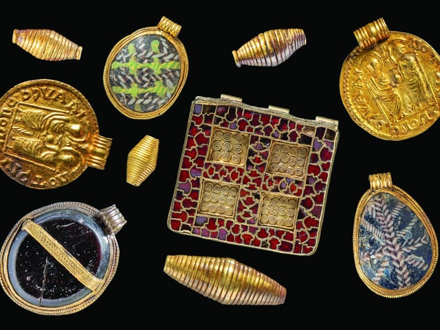 Collection of pendants from the Harpole Burial necklace