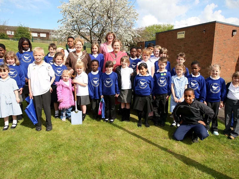 Northampton Mayor's consort Margaret Pritchard and Northampton Mayor Lee Mason planting a tree at Lings Primary School to mark the end of her term in office.