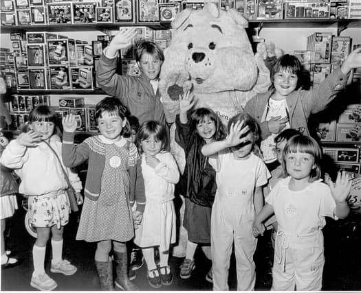 Children meet Care Bear at the Co-op toy department, 1986
