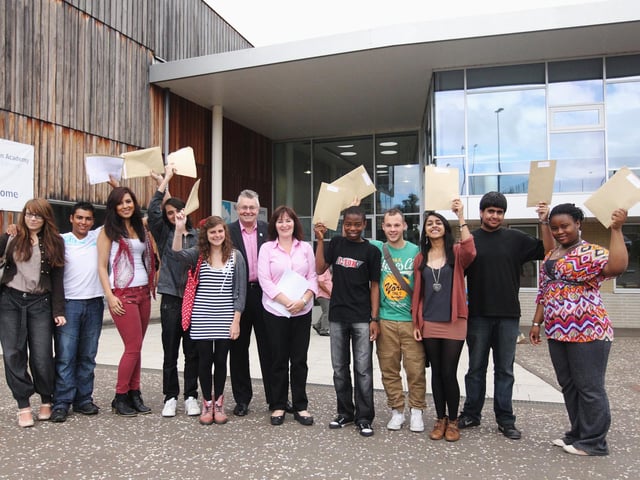 2011 - Outstanding pupils from Northampton Academy pictured with new principal Anne Hill and ex-principal Peter Hullah after receiving their GCSE results.