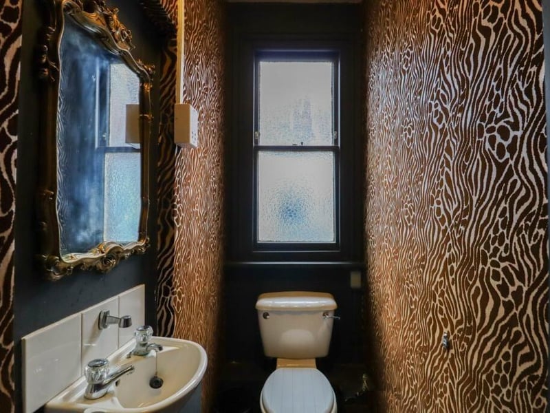 Another of the toilets in the five-bedroom property