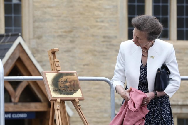 The Princess Royal reflected in the brass plaque