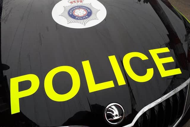 Police arrested a 16-yar-old boy and safeguarded a woman in her 20s during raids on two properties in Northampton on Thursday