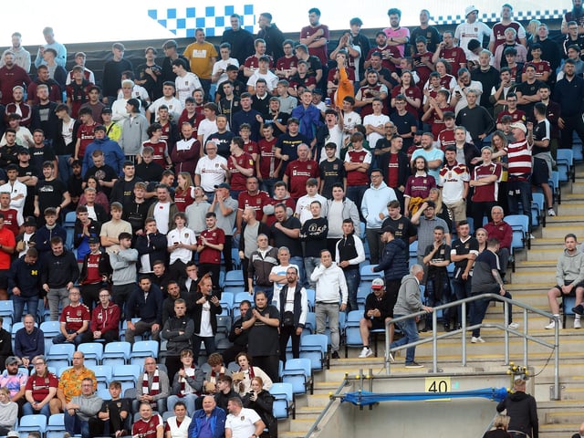 2021: Northampton Town fans look on during the Carabao Cup 1st round match between Coventry City and Northampton Town  at The Coventry Building Society Arena on August 11, 2021 in Coventry, England. (Photo by Pete Norton/Getty Images)