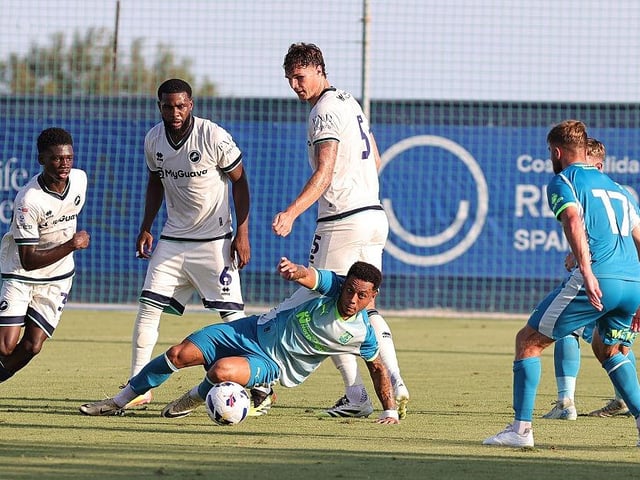 Elliott List and Michael Jacobs keep the ball away from Ben Drake, Japhet Tanganga and Jake Cooper