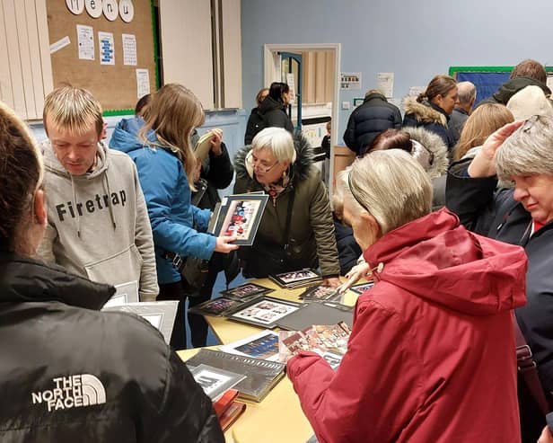 Visitors had the opportunity to browse through old school photos.