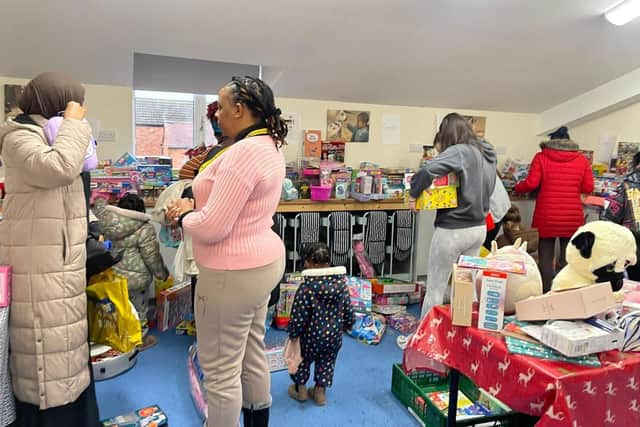 The team begins collecting donations of new toys and gifts every July, and they are well on their way to helping families experiencing financial difficulties this year.