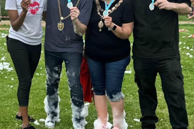 The Mayor and Mayoress of Northampton display their medals with Lorraine and Lee Lewis