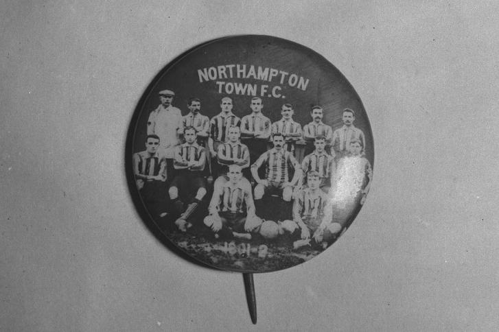 THIS picture shows a pin badge depicting Northampton Town FC in the 1901-02 season. Martin Kennedy gives more details: “ This season was their first season in the Southern League, which was the final step prior to joining the Football League in 1920. Although it is difficult to believe, other teams in the Southern League varied from Tottenham and West Ham to Wellingborough and Kettering, which meant there was a triple representation in the county. Results were certainly changeable, beating Swindon 8-0 and losing 11-0 to Southampton, along with beating Tottenham 3-1 and losing 1-0 to Wellingborough proving the point. One major achievement made by the team was reaching the first round of the FA Cup for the first time in their history. After winning through four qualifying rounds, the Cobblers played Sheffield United, who were one of the leading sides in the Football League at the time. The Cobblers lost 2-0 which obviously was no surprise. One famous name who appears in the team picture is that of Herbert Chapman, seated third left in the middle row. Chapman played for the Cobblers through this important season in the club’s history and became the manager between 1907 and 1912. However, it is his record of managing Arsenal and Huddersfield to League titles and FA Cups between the end of the 1920s and early 1930s which make him synonymous with greatness in the game. It would be understandable if most readers consider the 1901-02 team picture of the Cobblers to be insignificant, but it was one of the most important and interesting seasons for a number of years.”